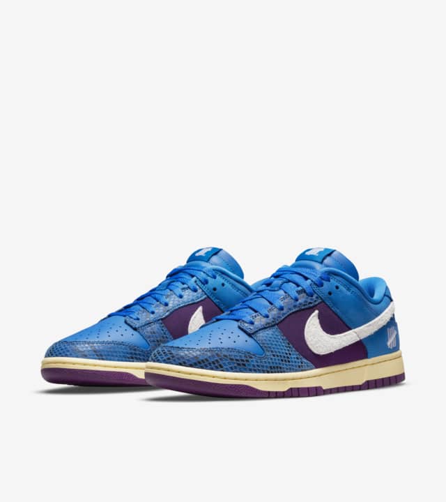 5 on it dunk low x undefeated